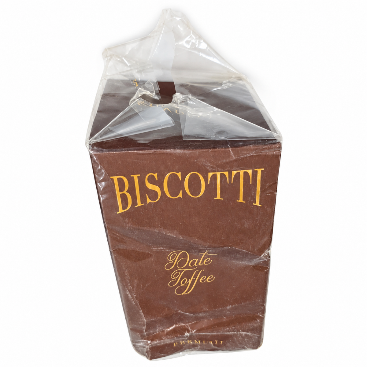 Open Box – Khadlaj Biscotti Date Toffee 100ml — condition photo 3 of 3: Outer box is crushed and dented. The plastic wrap is loose and torn.